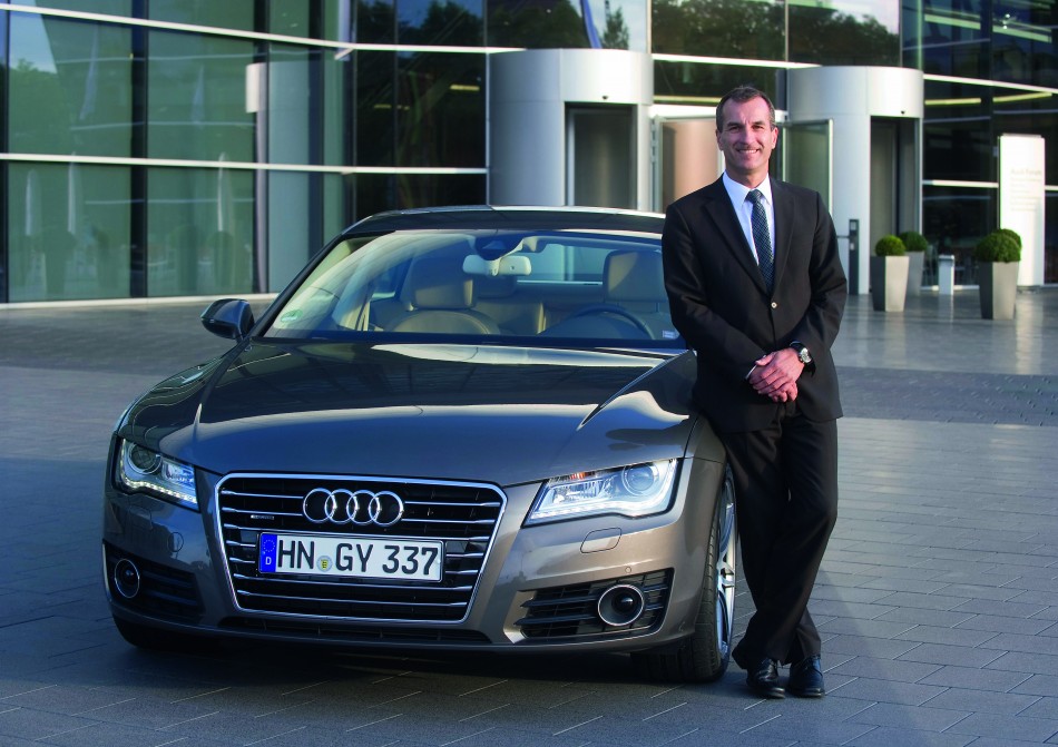 Audi A7 Sportback/Albrecht Reimold, Werkleiter Audi Neckarsulm, mit dem A7 Sportback.