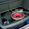 Weltpremiere am Woerthersee: Golf GTI Black Dynamic /Praezision im Detail - Soundanlage Focal Utopia mit 1.800 Watt Ausgangsleistung eingebaut im Heck auf einer Holzunterkonstruktion in Klavierlack-Finsh und geschuetzt durch eine Plexiglasabdeckung.