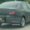 Peugeot 408 (T73 sedan) spotted undergoing camouflaged testing on the highway