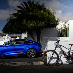 Audi SQ8 Sportback e-tron and Audi electric mountain bike powere