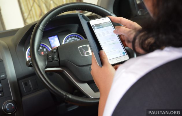 陆路交通局将采用摄像机对付边开车边玩手机的驾驶者！