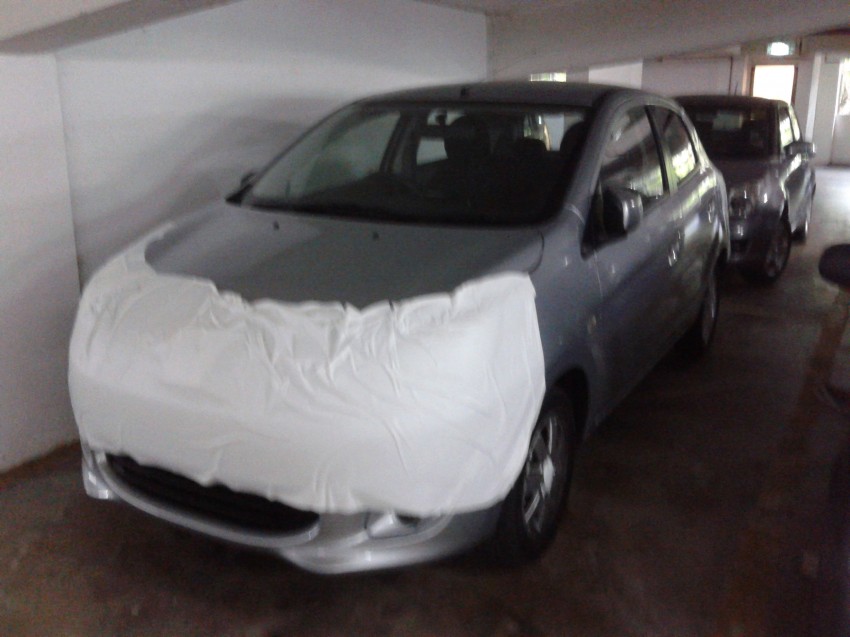 SPIED: Masked Mitsubishi Mirage spotted in a parking lot 103113