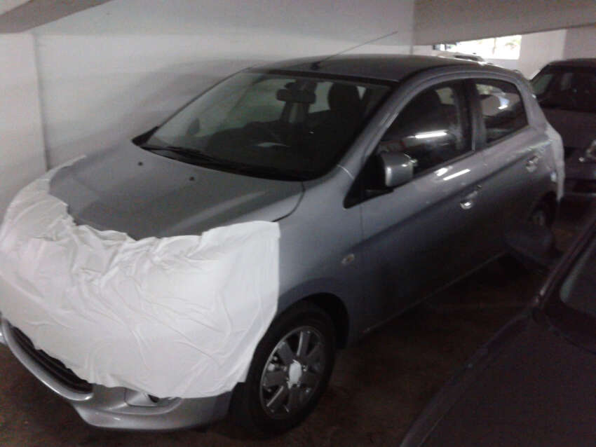 SPIED: Masked Mitsubishi Mirage spotted in a parking lot 103112