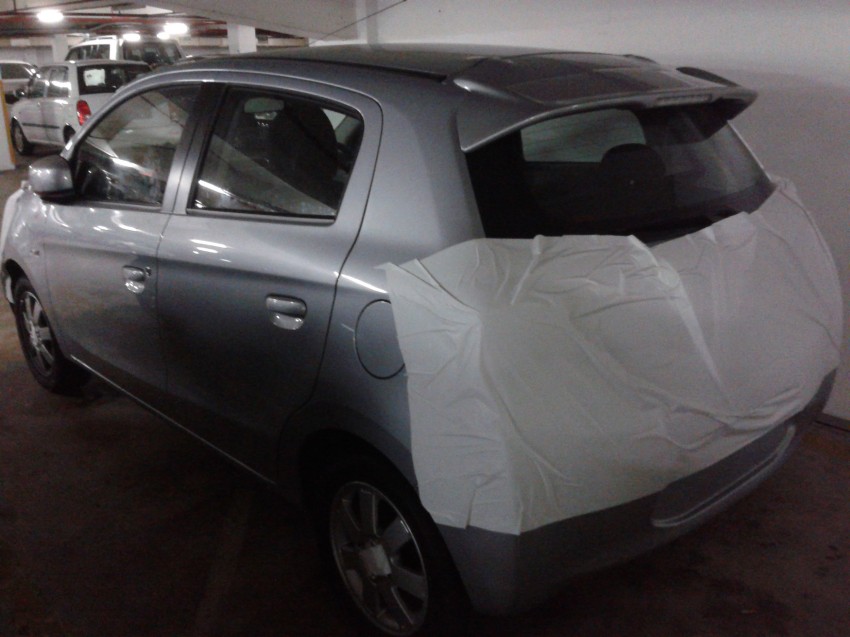 SPIED: Masked Mitsubishi Mirage spotted in a parking lot 103111