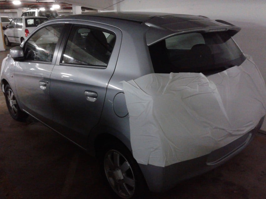 SPIED: Masked Mitsubishi Mirage spotted in a parking lot 103114