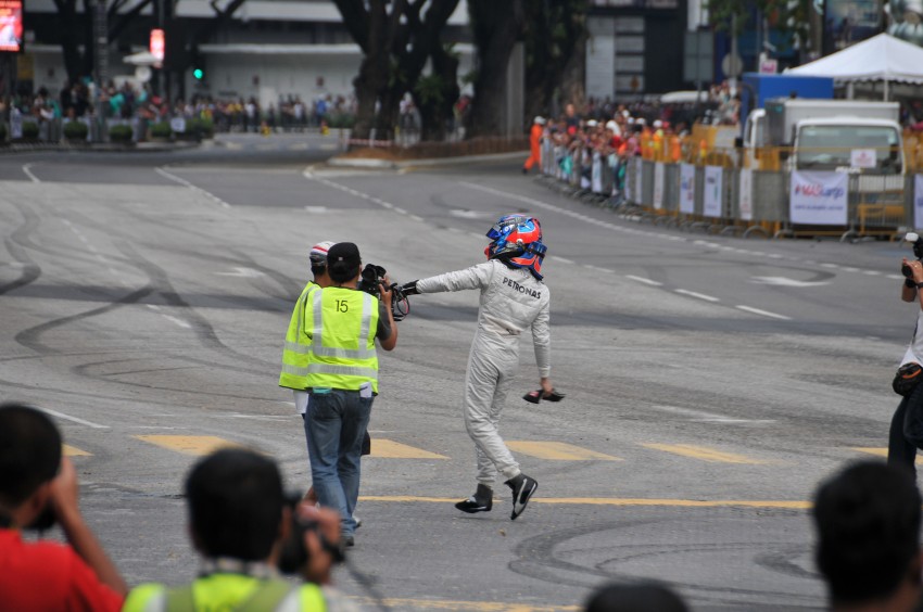 Jazeman Jaafar drives the Mercedes AMG Petronas W03 Formula 1 car around the streets of Kuala Lumpur 163042