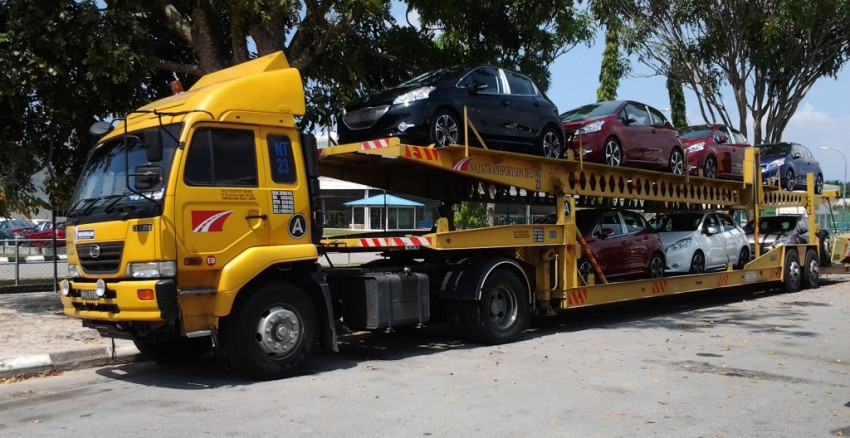 Peugeot 208 by the trailer load on the way to showrooms teased by Peugeot Malaysia FB 163385