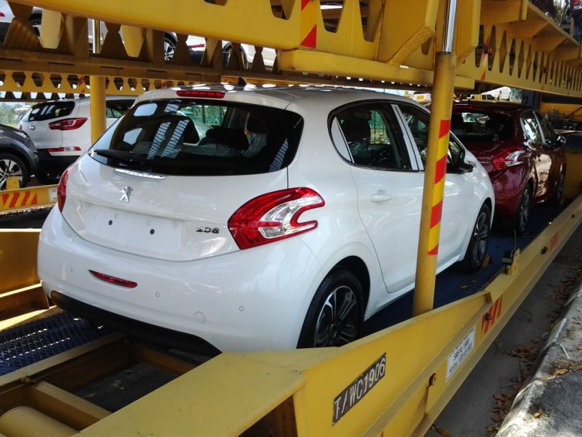 Peugeot 208 by the trailer load on the way to showrooms teased by Peugeot Malaysia FB 163386