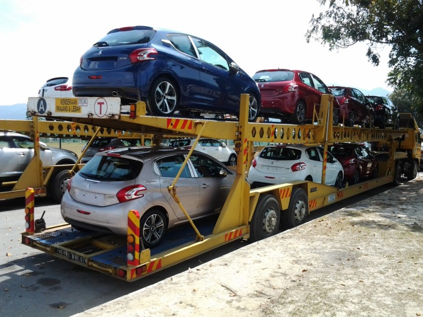 Peugeot 208 by the trailer load on the way to showrooms teased by Peugeot Malaysia FB 163387