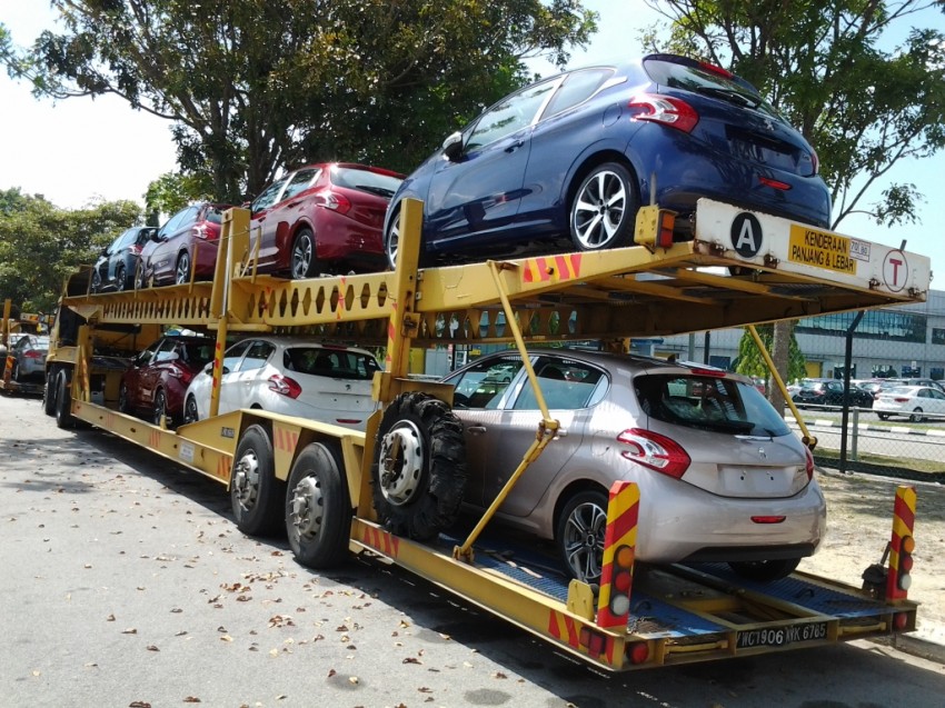 Peugeot 208 by the trailer load on the way to showrooms teased by Peugeot Malaysia FB 163388