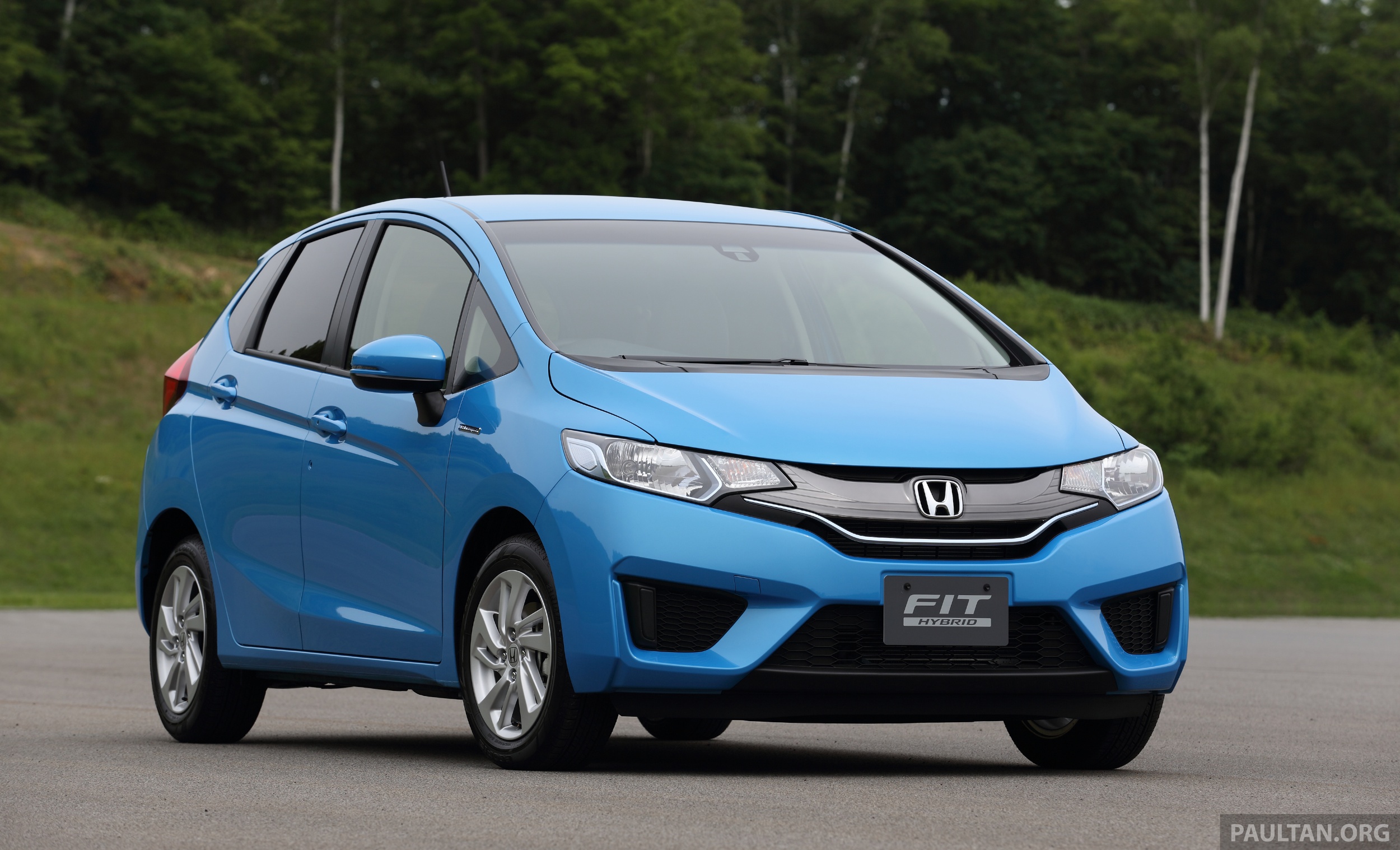 Хонда гибрид автомобиля. Honda Fit Hybrid 2014. Honda Jazz 2014. Honda Fit 2013 Hybrid. Honda Fit Hybrid 2015.