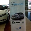GALLERY: Kia Cerato at the showroom with brochure
