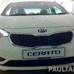 GALLERY: Kia Cerato at the showroom with brochure