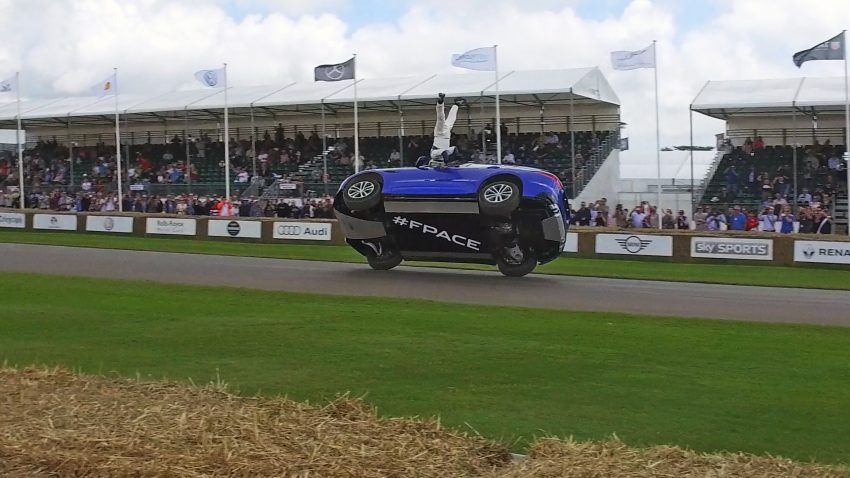 Jaguar F-Pace rides up Goodwood Hill on two wheels 513214