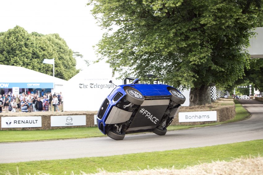 Jaguar F-Pace rides up Goodwood Hill on two wheels 513244