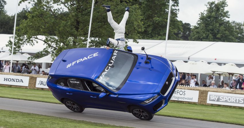 Jaguar F-Pace rides up Goodwood Hill on two wheels 513245