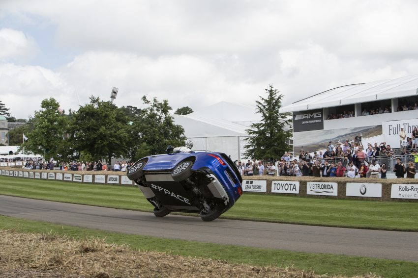 Jaguar F-Pace rides up Goodwood Hill on two wheels 513246