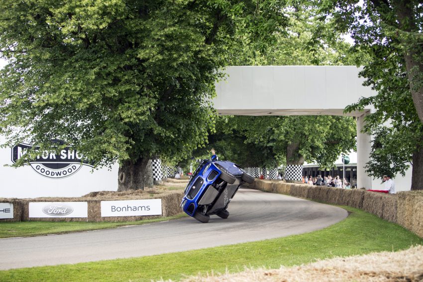Jaguar F-Pace rides up Goodwood Hill on two wheels 513247