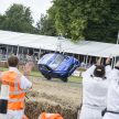 Jaguar F-Pace rides up Goodwood Hill on two wheels