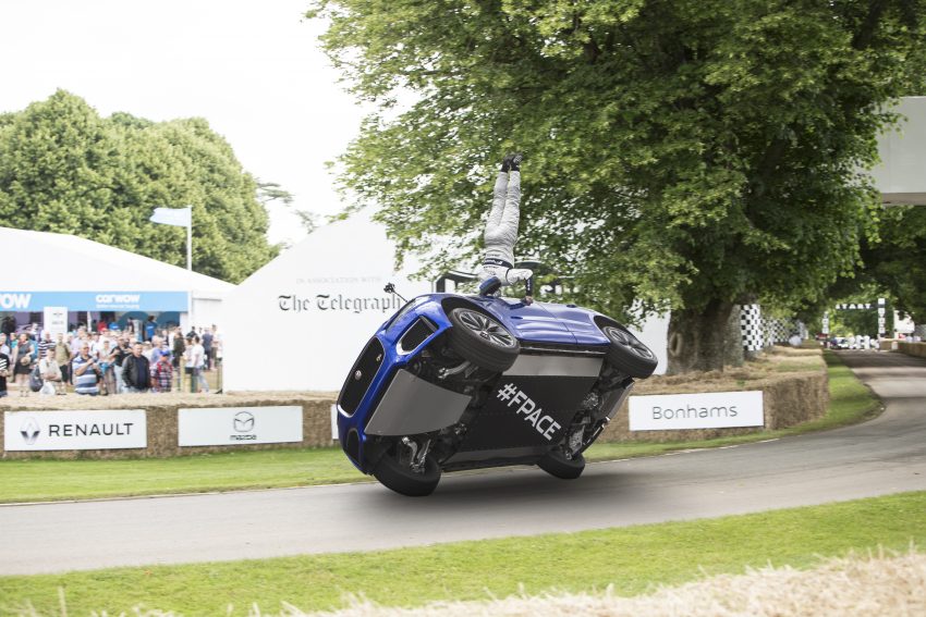Jaguar F-Pace rides up Goodwood Hill on two wheels 513249