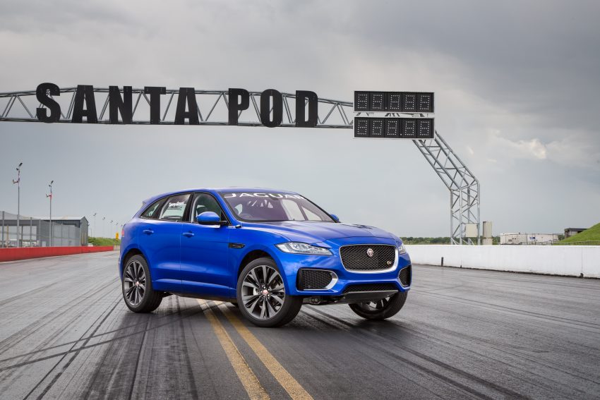 Jaguar F-Pace rides up Goodwood Hill on two wheels 513254