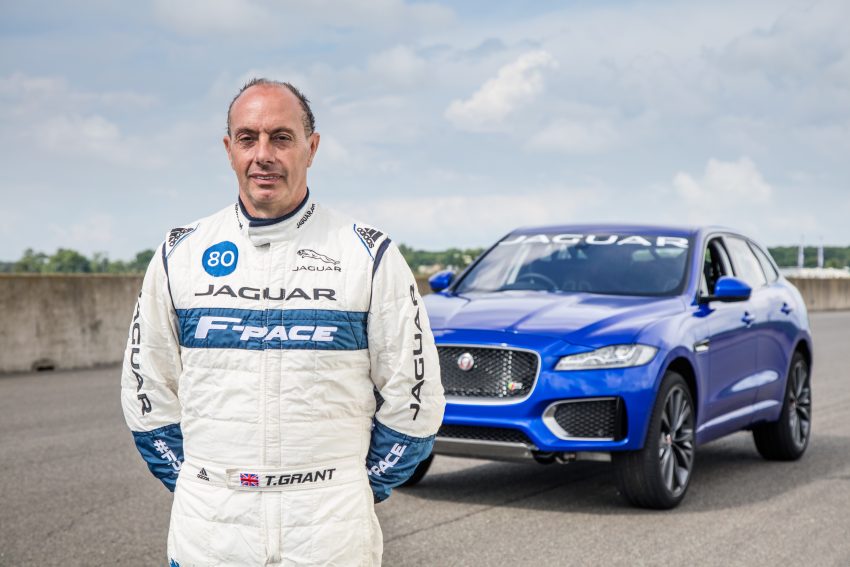 Jaguar F-Pace rides up Goodwood Hill on two wheels 513264