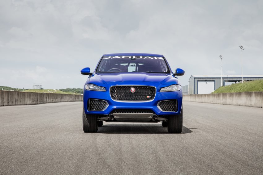 Jaguar F-Pace rides up Goodwood Hill on two wheels 513265