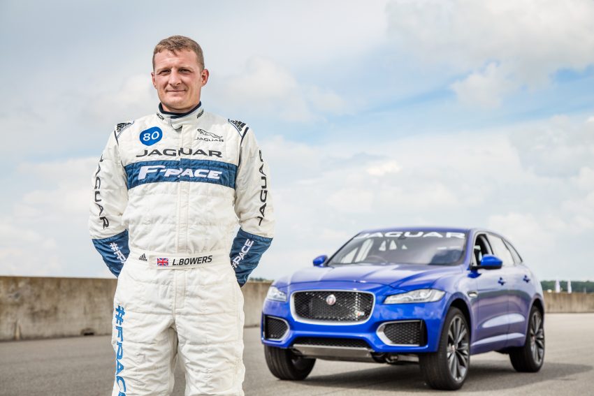 Jaguar F-Pace rides up Goodwood Hill on two wheels 513281