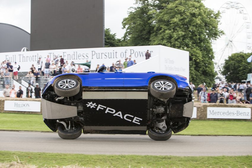 Jaguar F-Pace rides up Goodwood Hill on two wheels 513243