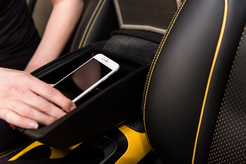 Nissan develops signal-blocking armrest storage – aims to curb use of smartphones while driving 654714