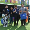 Proton taja pakaian raya untuk balu, anak-anak yatim bekas kakitangannya dalam program Kasih Ramadan