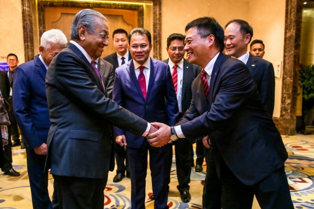 Proton exchanges documents for two deals in Beijing – Pakistan plant, RM1.88b loan for biz expansion