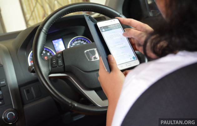 Leaving your phone on your lap while driving can get you fined up to RM1k or three months in jail - police