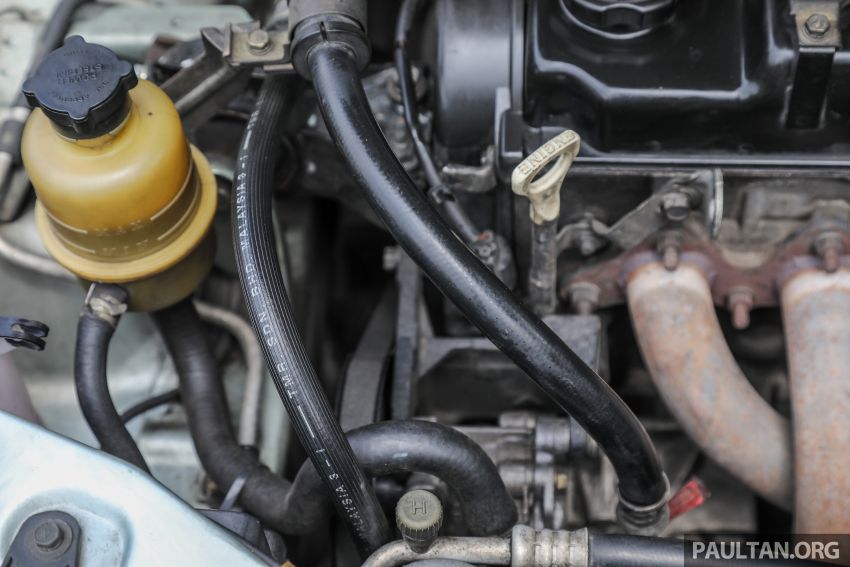 Safest method for cleaning a really dirty engine bay –  brush, towels and some elbow grease, not water hose 1237082