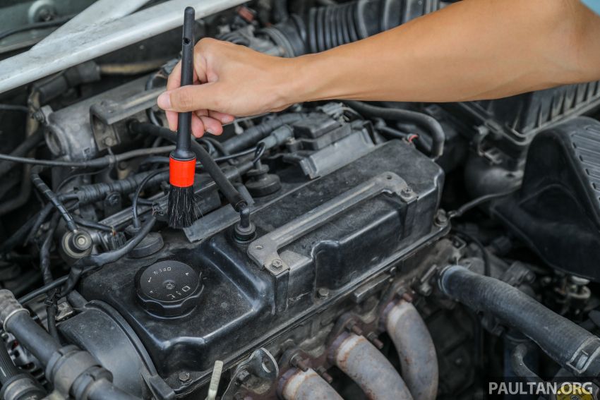 Safest method for cleaning a really dirty engine bay –  brush, towels and some elbow grease, not water hose 1237060