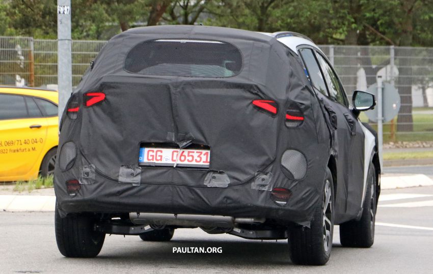 Fifth-gen Kia Sportage teased ahead of July debut; interior to feature integrated curved display 1300460