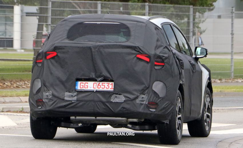 Fifth-gen Kia Sportage teased ahead of July debut; interior to feature integrated curved display 1300461