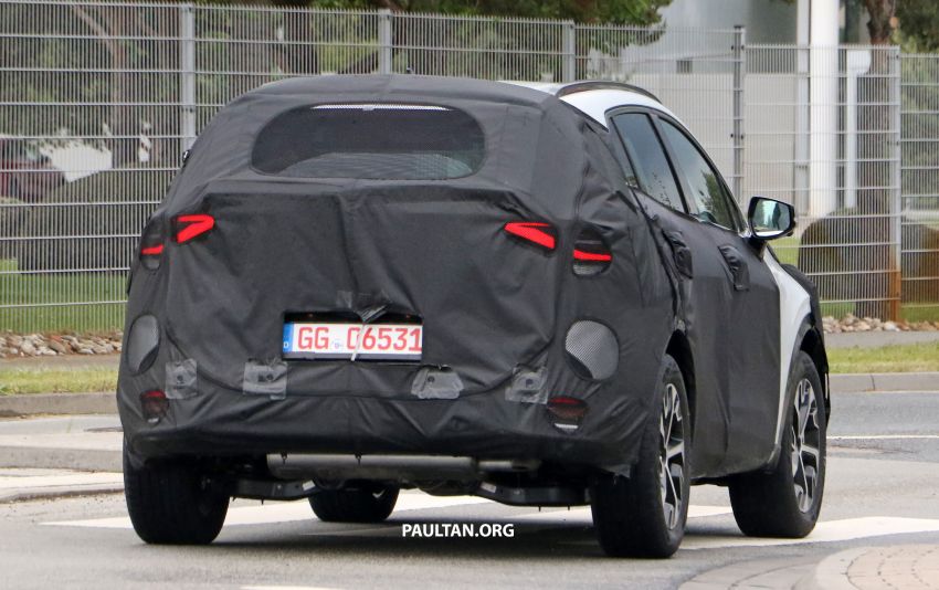 Fifth-gen Kia Sportage teased ahead of July debut; interior to feature integrated curved display 1300462