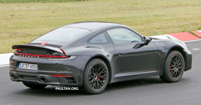 SPYSHOTS: Porsche 911 ‘Safari’ seen testing on track 1318184