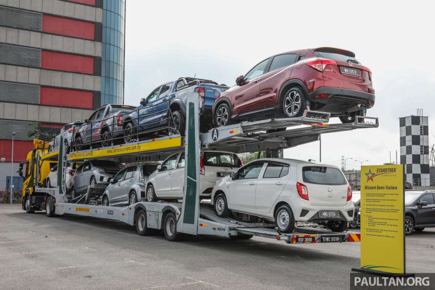Starrtrek Carriers launches the first fully-enclosed car carrier service in Malaysia, with a Rolfo Auriga Deluxe 1430196