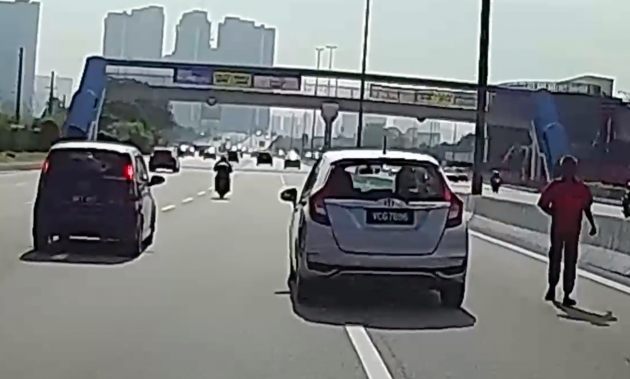 Man walked against traffic on NPE highway’s fast lane; AEB kicked in to help camcar avoid accident – video