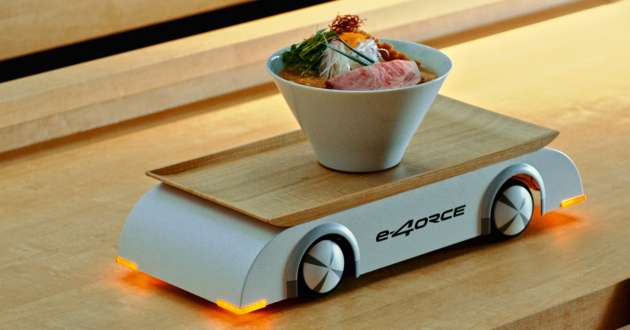Nissan demonstrates smoothness of Ariya’s e-4ORCE AWD electric powertrain with a robot ramen server tray