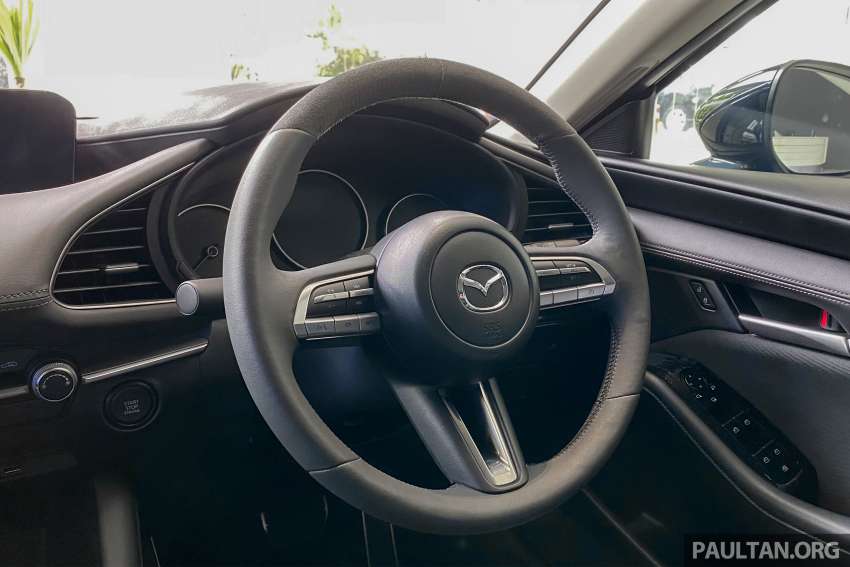 2022 Mazda 3 with Mazdasports body kit, dark grille surround, leather/suede interior on display in Malaysia 1460919