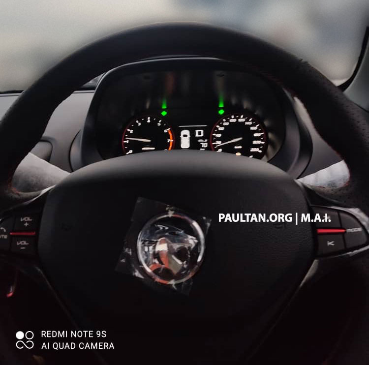 2022 Proton Saga MC2 interior spied – new OS and AC control panel; red accents on meter, vents, steering Image #1451471