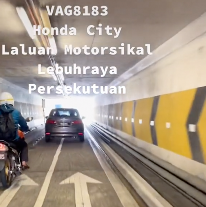 Police looking for driver of Honda City caught driving on Federal Highway bike lane, PJ to Klang direction 1478054