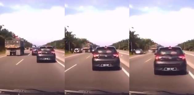 Motorists changing tyre on roadside get hit by lorry