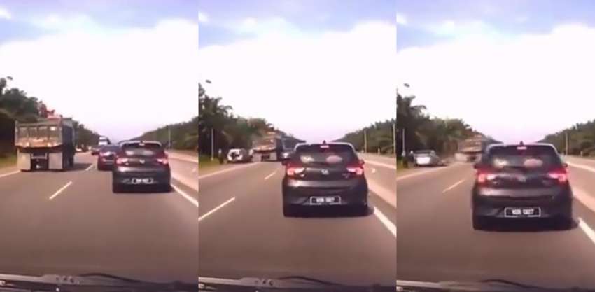 Motorists changing tyre on roadside get hit by lorry 1464942
