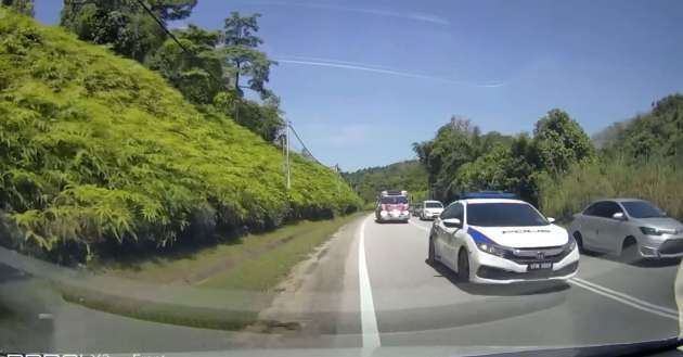 VIDEO: Polis iringi trak bawa kereta mewah dikesan memotong secara bahaya di laluan garisan berkembar
