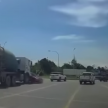 Saga gets into blind spot of cement lorry as they both turn, gets dragged – make sure you’re in trucks’ view