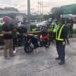 Rider dumps fiancee at JPJ Penang road block